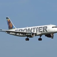 米フロンティア・グループ・ホールディングス傘下のフロンティア航空の旅客機＝米バージニア州（共同）