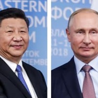 中国の習近平国家主席、ロシアのプーチン大統領（いずれもタス＝共同）