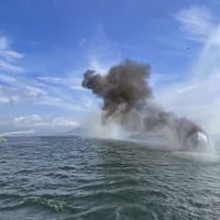 広島市南区の似島沖で炎上する旅客船「黒潮7」＝15日午前（広島海上保安部提供）