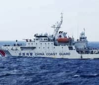2021年12月に沖縄県・尖閣諸島周辺の領海に侵入した中国海警局の艦船（第11管区海上保安本部提供）
