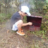 昨年度のようす（宝箱を探す参加者）
