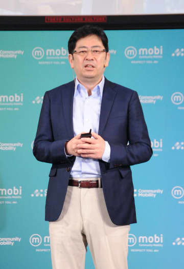 記者会見する「コミュニティー・モビリティー」の村瀬茂高社長＝21日午前、東京都渋谷区