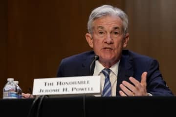 米議会で証言する連邦準備制度理事会（FRB）のパウエル議長＝22日、ワシントン（ロイター＝共同）
