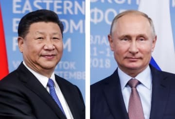 中国の習近平国家主席、ロシアのプーチン大統領（いずれもタス＝共同）