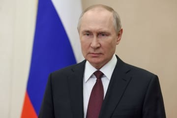ロシアのプーチン大統領＝10日、モスクワ（ロイター＝共同）