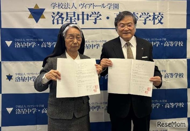 「事業譲渡契約書」に調印